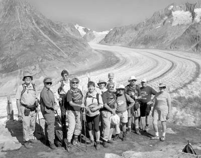 Connie Doty (waving) and Orinda Hiking Club friends at the Aletsch Glacier. 