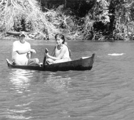 Locals fishing from a dugout canoe — Rio Dulcé River, Guatemala. Photos: McDysan