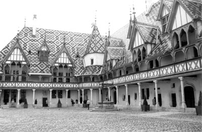 The 15th-century Hospices de Beaune has Flemish-style tiled roofs, artwork and a posh interior to insure a place in heaven for the donor, Nicolas Rolin, and his wife, Guigone.