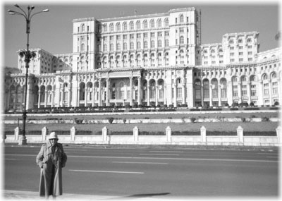 June Griffin in front of Parliament Palace, Bucharest.