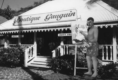 A life-size replica of the famous artist stands outside the Boutique Gauguin in Bora Bora.