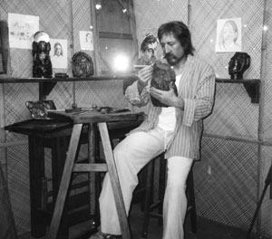 A figure of Paul Gauguin creating a sculpture is on exhibit at the Pearl Museum in Papeete.
