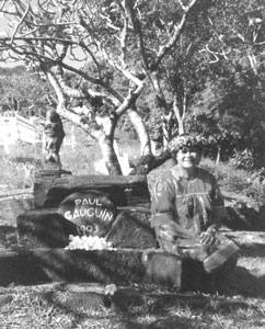 Tourist guide Frida Peterano stops at the grave of Paul Gauguin on Hiva Oa Island in the Marquesas.