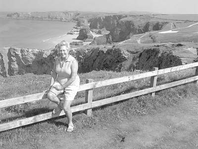 Margaret Dear with the Bedruthan Steps in the background. 