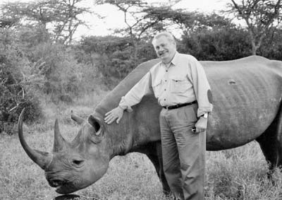 Claus Hirsch with a tame rhino in Kenya.