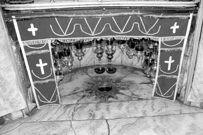 Altar of the Nativity in Bethlehem. The silver star is said to mark the exact spot of Jesus’ birth. — Photo by Daniel Kacvinski