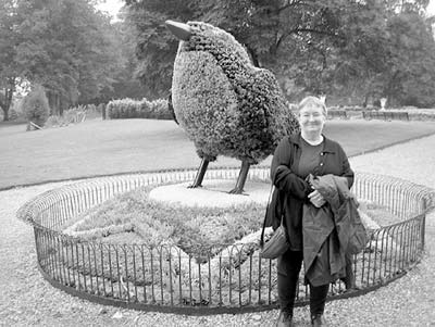 Erica and a topiary bird at Waddesdon Manor. 