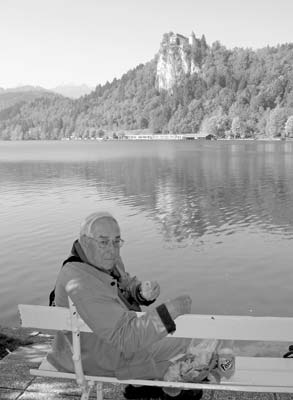 Galen enjoys a picnic lunch on the shore of Lake Bled, Slovenia.