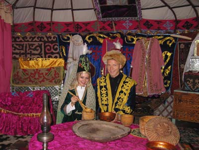 My husband, Frank, and I, dressed in traditional Kazakh garb, inside a yurt in Borovoye.