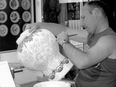 Artist in the Royal Delftware Factory.
