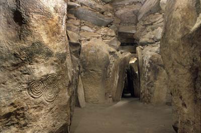 Looking out from inside the central chamber of Newgrange, the corridor is very narrow. — Photo courtesy of the Ireland Department of the Environment, Heritage & Local Government