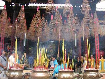 Incense for sale at a market in Vietnam.