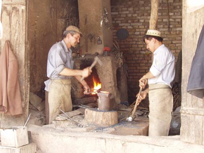 Blacksmiths in Kashgar.