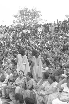 Indian women and men seated separately at the ceremony. Photo: Clyde Holt