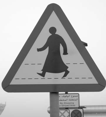Culturally appropriate crosswalk sign in Qatar. Photos: Neilson