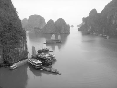 This shot was taken during a stopoff at Sung Sot Caves during a 2-day cruise of Halong Bay on the boat Ginger (the double-sailed boat in the background). Photos: Orser
