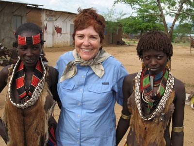 Deborah Levine with two Hamar women in Turmi. 