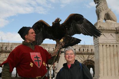Betty getting ready to hold this large bird of prey — Buda Castle area.