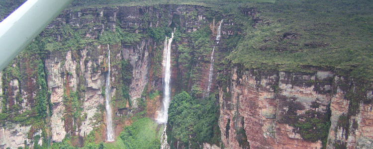 Waterfalls cascade from Auyantepui, located in Canaima National Park, Venezuela.