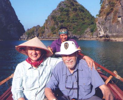 Lorna Tjaden, Carl Weiser and their guide in Halong Bay, Vietnam.
