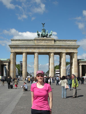 Jennifer Petoff in front of the Brandenburg Gate.