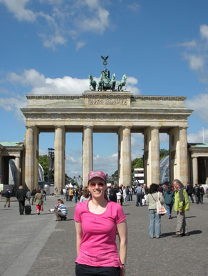 Jennifer Petoff in front of the Brandenburg Gate.