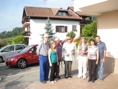 M’Liss Hinshaw (center, in sunglasses) and relatives at their guest house in Metlika. Photo by Rok Puppis 