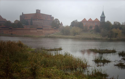 A view of Malbork with its castle (on left).