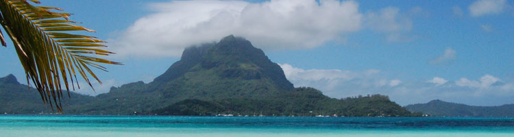 Bora Bora with the famous Mt. Otemanu covered by a cloud.
