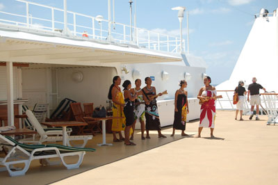 Les Gauguins entertained passengers on the top deck as we sailed into the lagoon at Rangiroa, Tuamotu Archipelago.