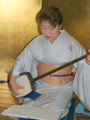 A geisha entertains at the once-busy training school, Kisarazu Geisha.