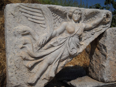 Stone carving of the Greek goddess Athena Nike at Ephesus.