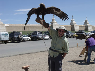 Rod Smith holding a golden eagle.