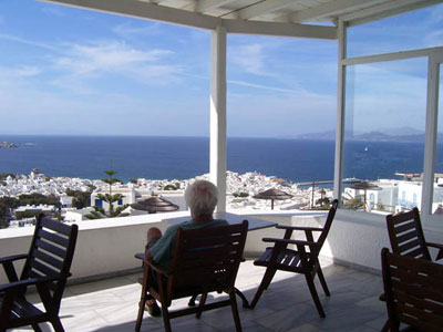 Enjoying the view of the Aegean from the breakfast room terrace of the Alkyon Hotel on Mykonos.