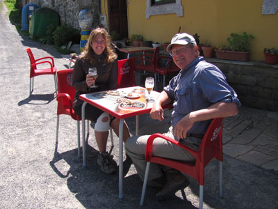 Time to celebrate! Teresa O’Kane and her husband, Scott Soper, on day 37 of their trek — one day from Santiago.