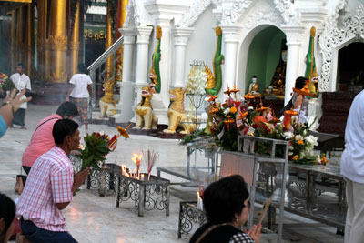 Offering prayers at Shwedagon Pagoda.