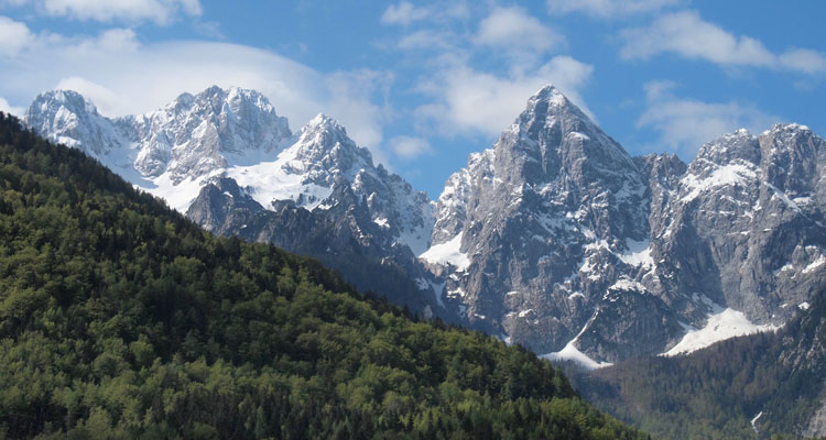 The road leading toward Mt. Vršič Pass offers dramatic alpine scenery.
