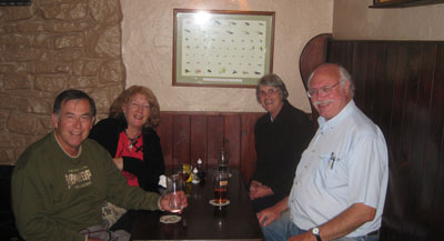 Clockwise from left: Carl Chavez, Roisin Sharp, Margaret Chavez and Bill Timms at dinner.