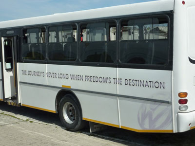On Robben Island, visitors are driven around in buses that each have a different uplifting, inspiring saying painted on the side.