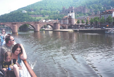 From the river, a view of the Old Bridge and castle in Heidelberg. Photo by Robert Meyerhof