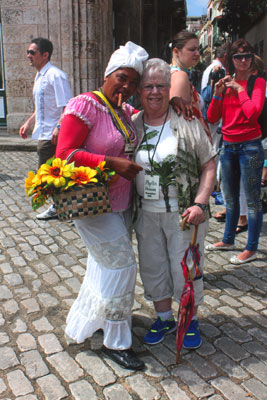 Phyllis with a cigar-smoking Cuban woman. It costs $1 to take a picture with one of these colorful ladies.