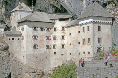 Predjama Castle occupies a cave entrance. Photo: Patten