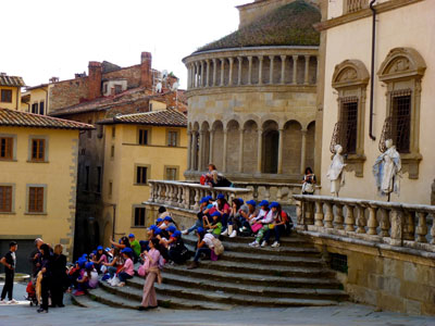 Santa Maria della Pieve on Piazza Grande — the only tour group we saw.