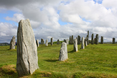 Erected around, perhaps, 3000 BC on the Isle of Lewis in the Outer Hebrides, the Calanais (Callanish) Standing Stones are the best known of a number of stone circles, standing stones and cairns in Scotland. Many are under the care of Historic Scotland. Photo by John Graham<br />
