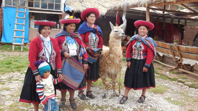 Ladies of the Chinchero weaving co-op with Pancho, their llama.