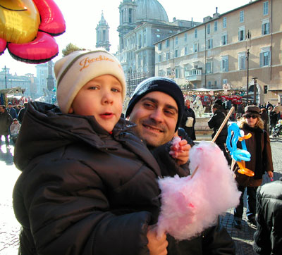 Families enjoy Piazza Navona’s Christmas market.