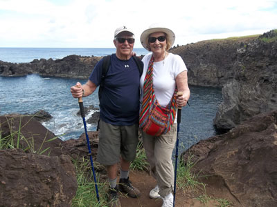 Marvin and Judy, the Pacific at their backs, at Ana Kai Tangata cave.