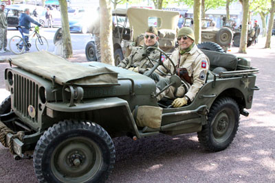 Two 82nd Airborne reenactors in their ’40s-era jeep.
