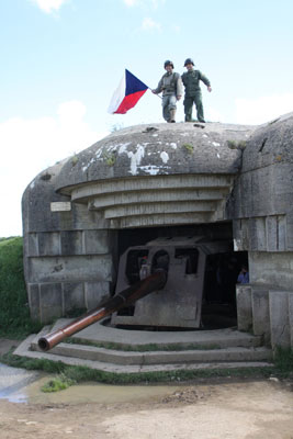One of four German 152mm navy guns, each protected by a large concrete casemate, at Longues-sur-Mer.
