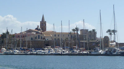 View from the harbor of Alghero’s Old City.